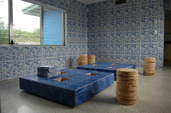 Gean Moreno and Ernesto Oroza. Untitled (decoy), 2010. Wood and found tiles. Functional object 48” x 48” x 12”