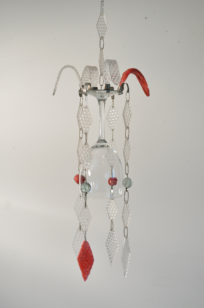 Horizon. Wind chime hanging fixed with red napalm b. Glass, aluminum, iron, clear acrylic, red napalm b. 2013